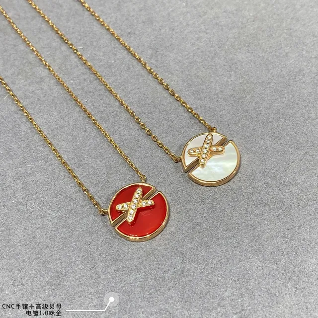 Collier X-Bar avec perle mère de ton doré 6