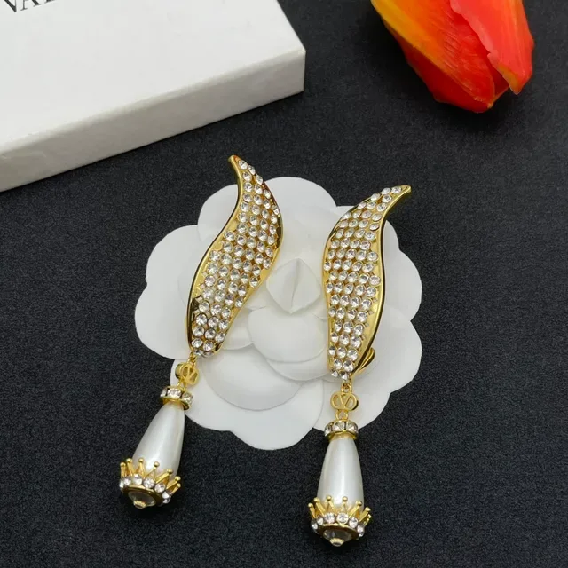 Gold White Pavé Crystal Wings Teardrop Pearl Drop Earrings 8
