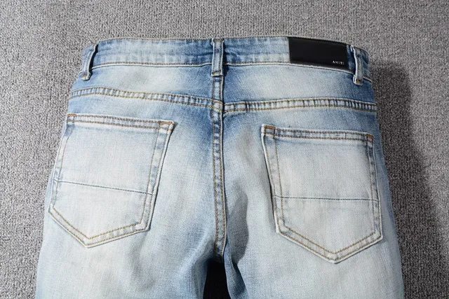 Light-Wash Distressed Ripped Slim-Fit Jeans 12