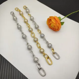 Braceletes de eslabões retorcidos com contas texturadas em prata e dourado