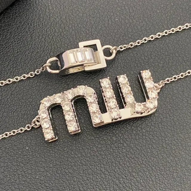 Silver-Tone Pavé Crystal 'MU' Logo Chain Bracelet 4
