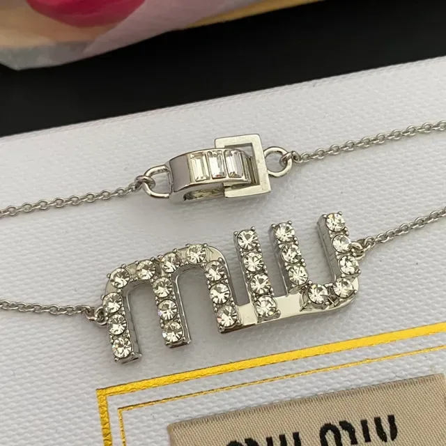 Silver-Tone Pavé Crystal 'MU' Logo Chain Bracelet 5