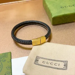 Gucci Pulsera de Cuero Trenzado Negro y Oro con Cierre Magnético
