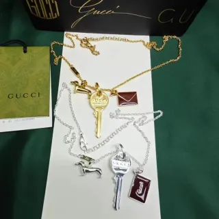 Gucci Gold Burgundy Key-Shaped Pendant Dachshund Charm Necklace