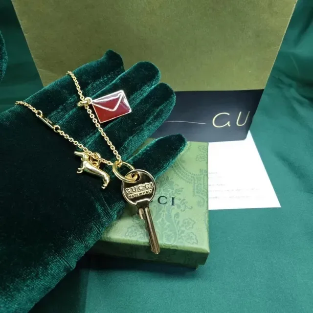 Gucci Gold Burgundy Key-Shaped Pendant Dachshund Charm Necklace 2