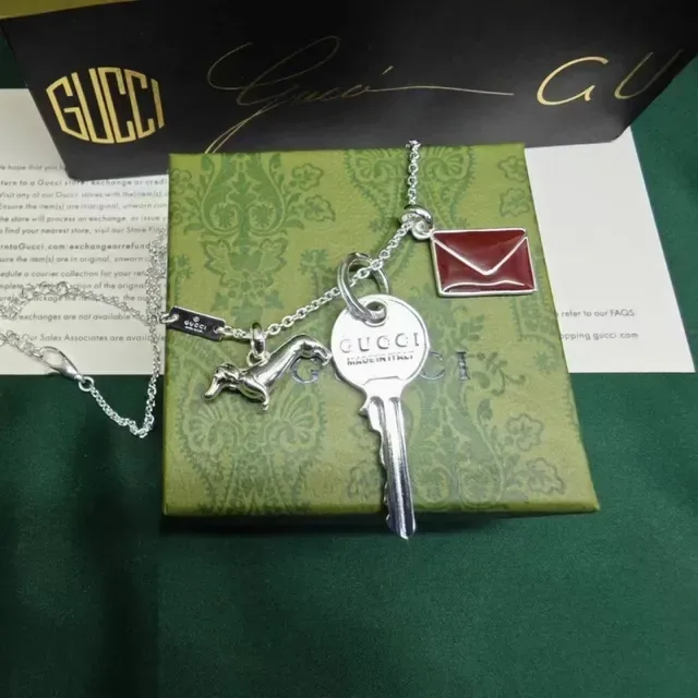 Gucci Gold Burgundy Key-Shaped Pendant Dachshund Charm Necklace 3