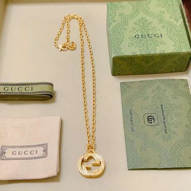 Gucci सلسلة ذهبية interlocking double-g تعليقة قلادة 7