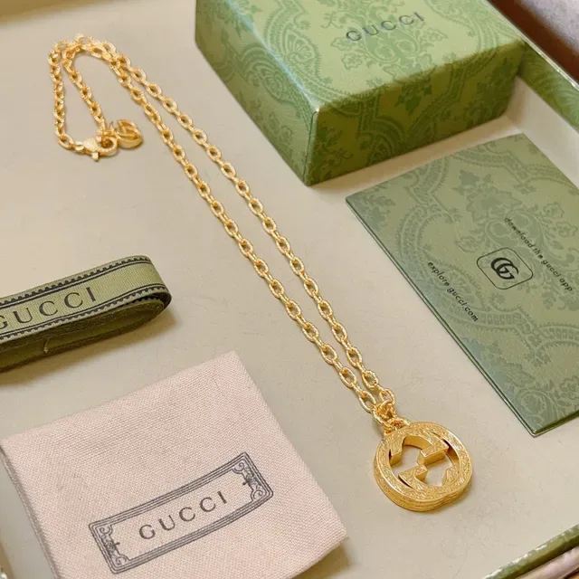 Gucci सلسلة ذهبية interlocking double-g تعليقة قلادة 9