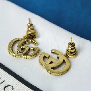 Gucci Gold Interlocking G Logo Ribbed Texture Earrings