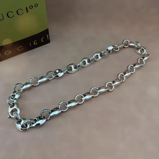 Gucci Iconic Chain Floral-Engraved Silver Tone Bracelet 6