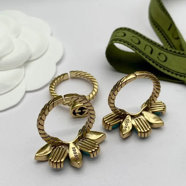 Gucci Marmont-Inspired Turquoise Bow and Interlocking G Gold-Tone Rings 6