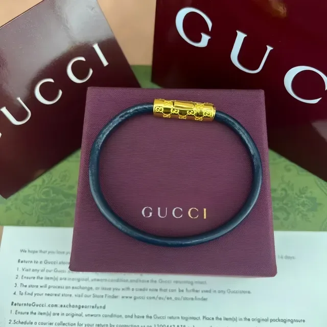 Gucci Navy Silver Round Leather Cord Cylindrical Engraved Metal Clasp Bracelet 7