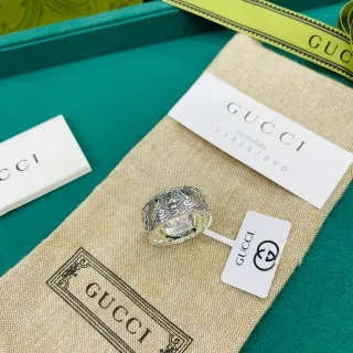 Gucci Ornate Relief-Carved Silver-Toned Wide Band Ring