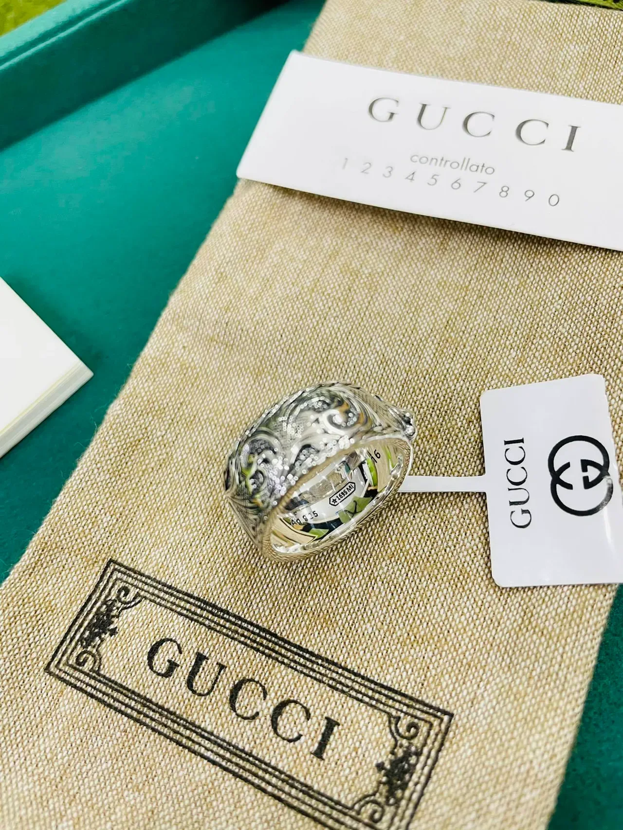 Gucci Ornate Relief-Carved Silver-Toned Wide Band Ring 7