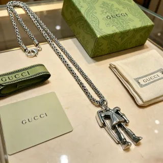 Gucci Silver Articulated Figurine Pendant Necklace