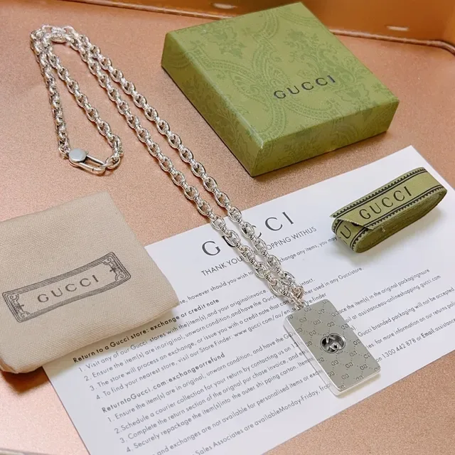 Gucci Silver-Tone Monogram Pendant Necklace 9