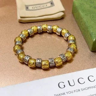 Gucci سوار ثنائي اللون نقش الشعار خرز مرن