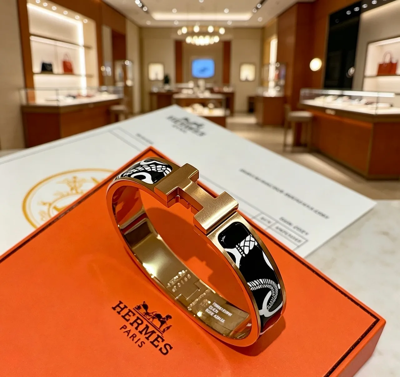 Hermès Clic H pulseira tom dourado preto branco esmalte pulseira 3