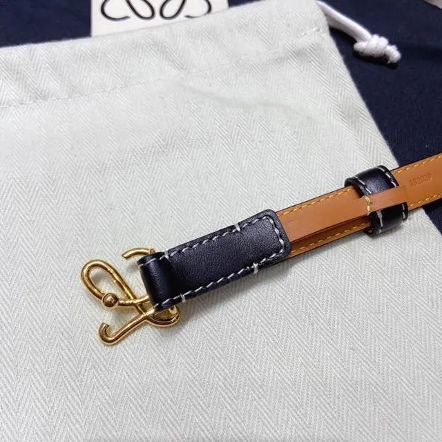 Ceinture Loewe Anagram Noir Doré Étroit Couture Blanche Contraste Cuir 6