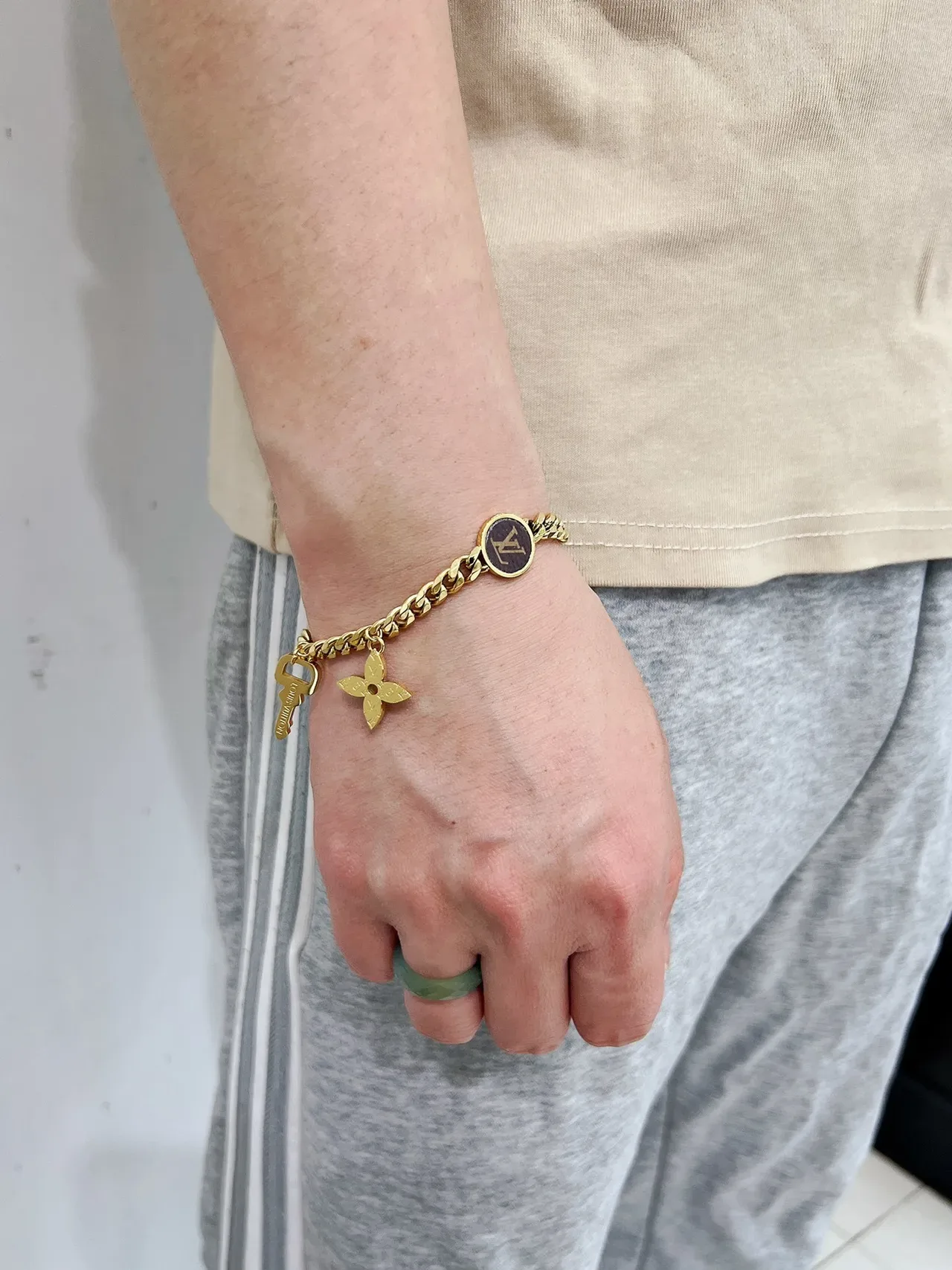 Louis Vuitton Gold and Silver Tone Chain Charm Bracelets 3