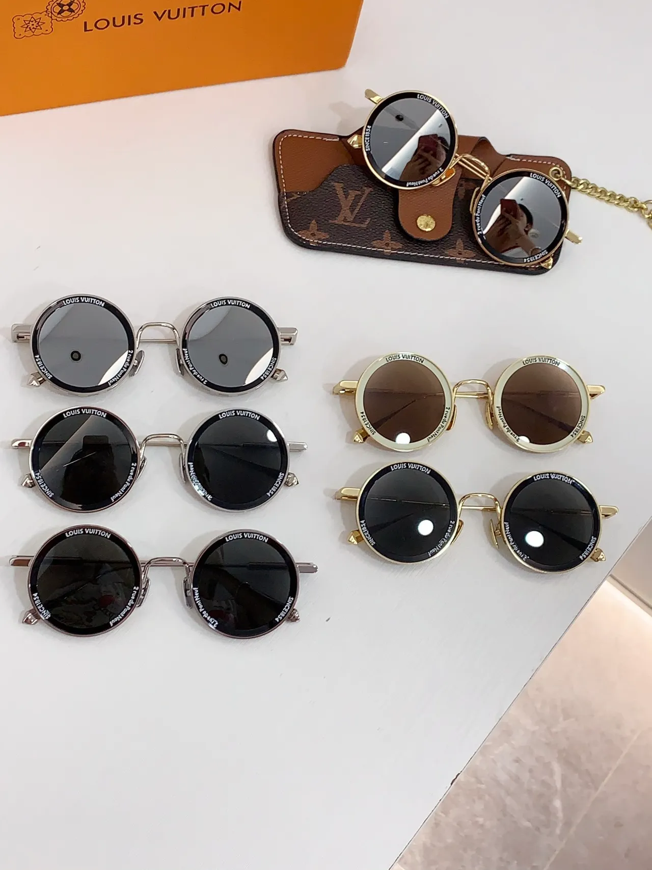 Louis Vuitton Lunettes de soleil cadre métal rond doré marron fin double pont 3