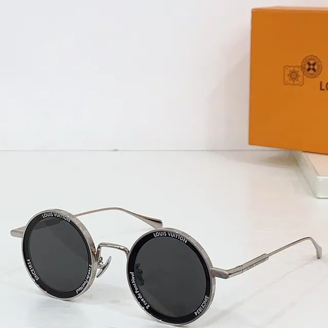 Louis Vuitton Lunettes de soleil cadre métal rond doré marron fin double pont 7