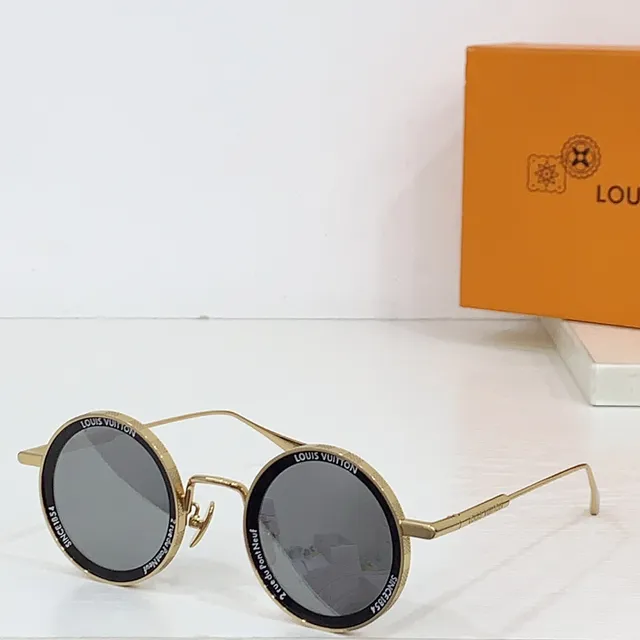 Louis Vuitton Lunettes de soleil cadre métal rond doré marron fin double pont 9
