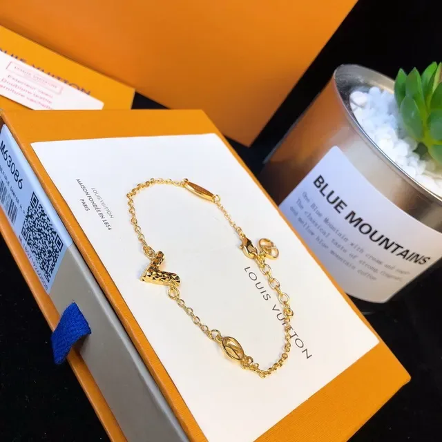 Louis Vuitton Gold Heart Pendant Chain Bracelet 8