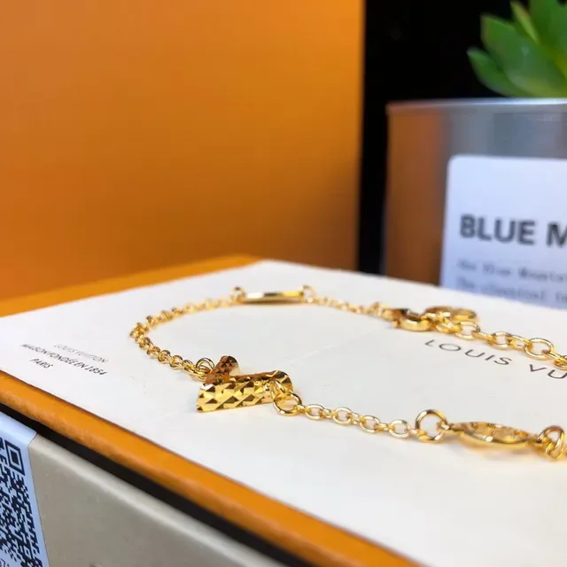 Louis Vuitton Gold Heart Pendant Chain Bracelet 9