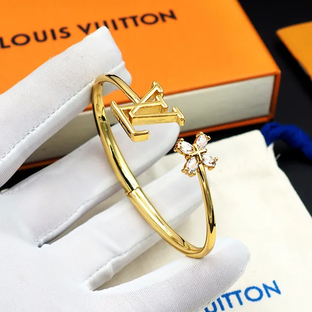 Bracelet Louis Vuitton doré LV monogramme et fleur de cristal ouvert 5