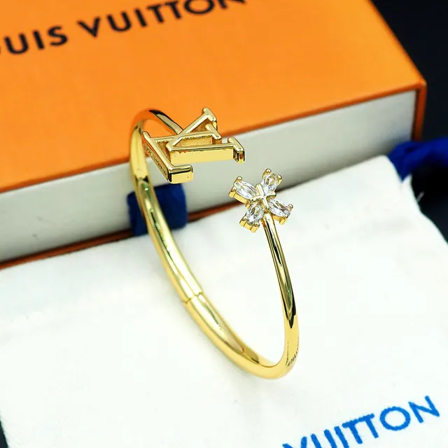 Bracelet Louis Vuitton doré LV monogramme et fleur de cristal ouvert 6
