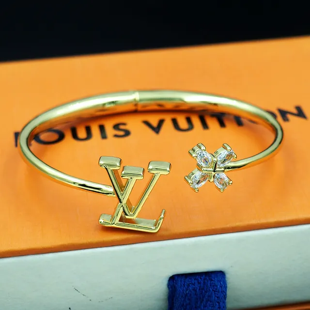 Bracelet Louis Vuitton doré LV monogramme et fleur de cristal ouvert 7