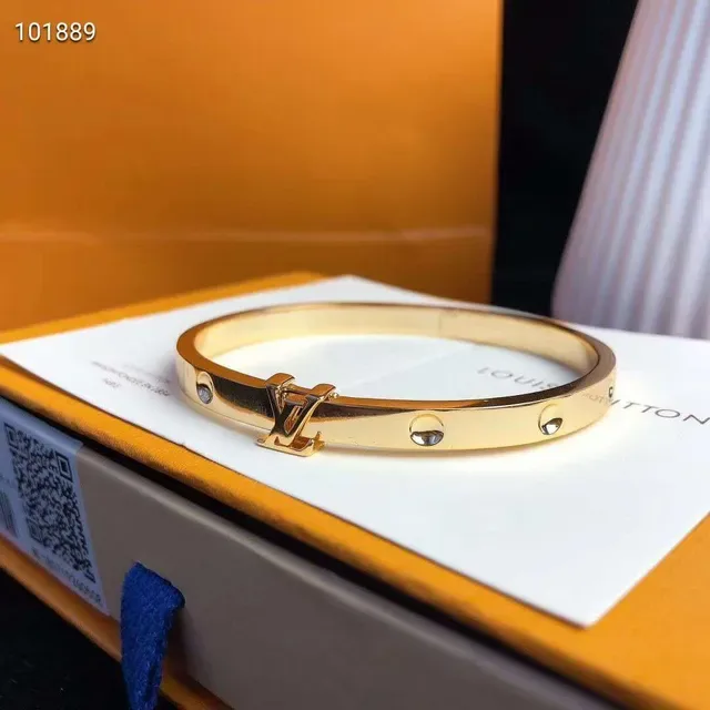 Louis Vuitton Gold-Tone Monogram Clasp Hinged Bangle Bracelet 5