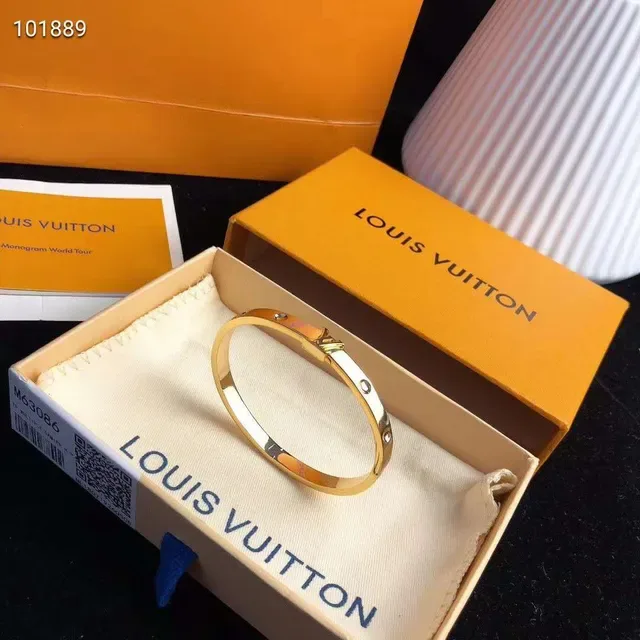 Louis Vuitton Gold-Tone Monogram Clasp Hinged Bangle Bracelet 8