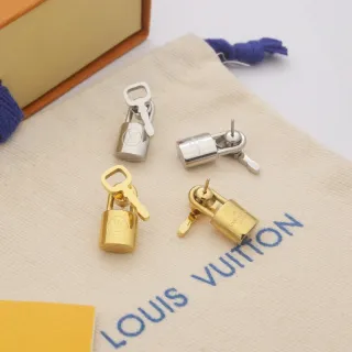 Louis Vuitton Lock and Key Gold Silver Motif Polished Metal Earrings