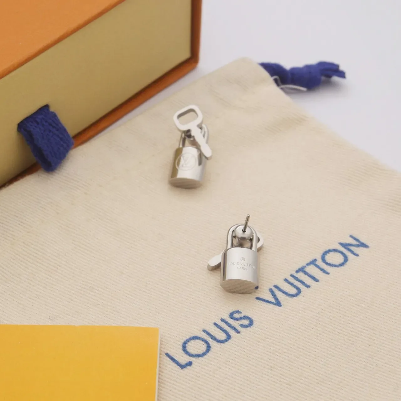 Louis Vuitton Lock and Key Gold Silver Motif Polished Metal Earrings 2