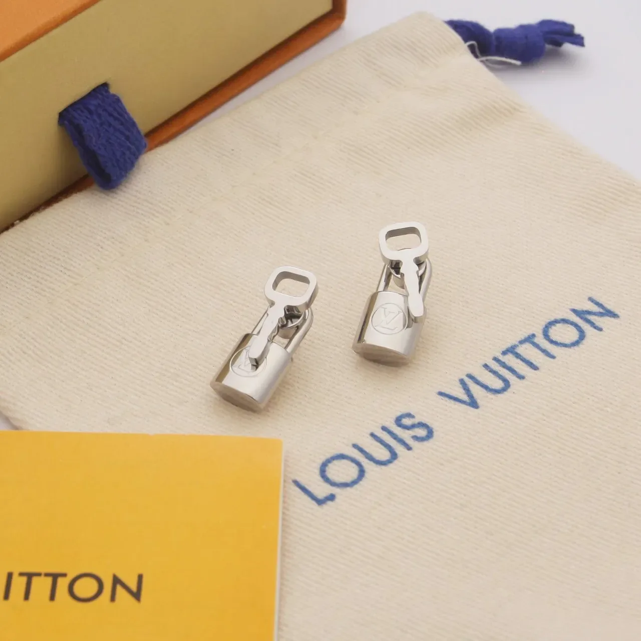 Louis Vuitton Lock and Key Gold Silver Motif Polished Metal Earrings 5