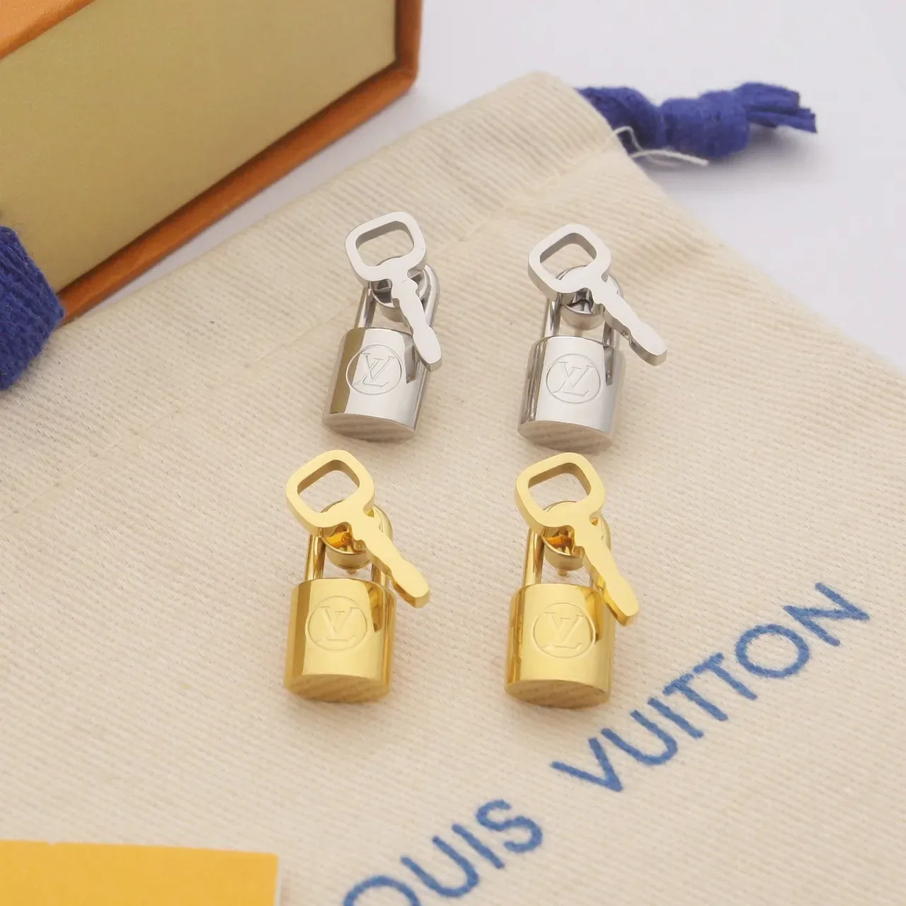 Louis Vuitton Lock and Key Gold Silver Motif Polished Metal Earrings 7