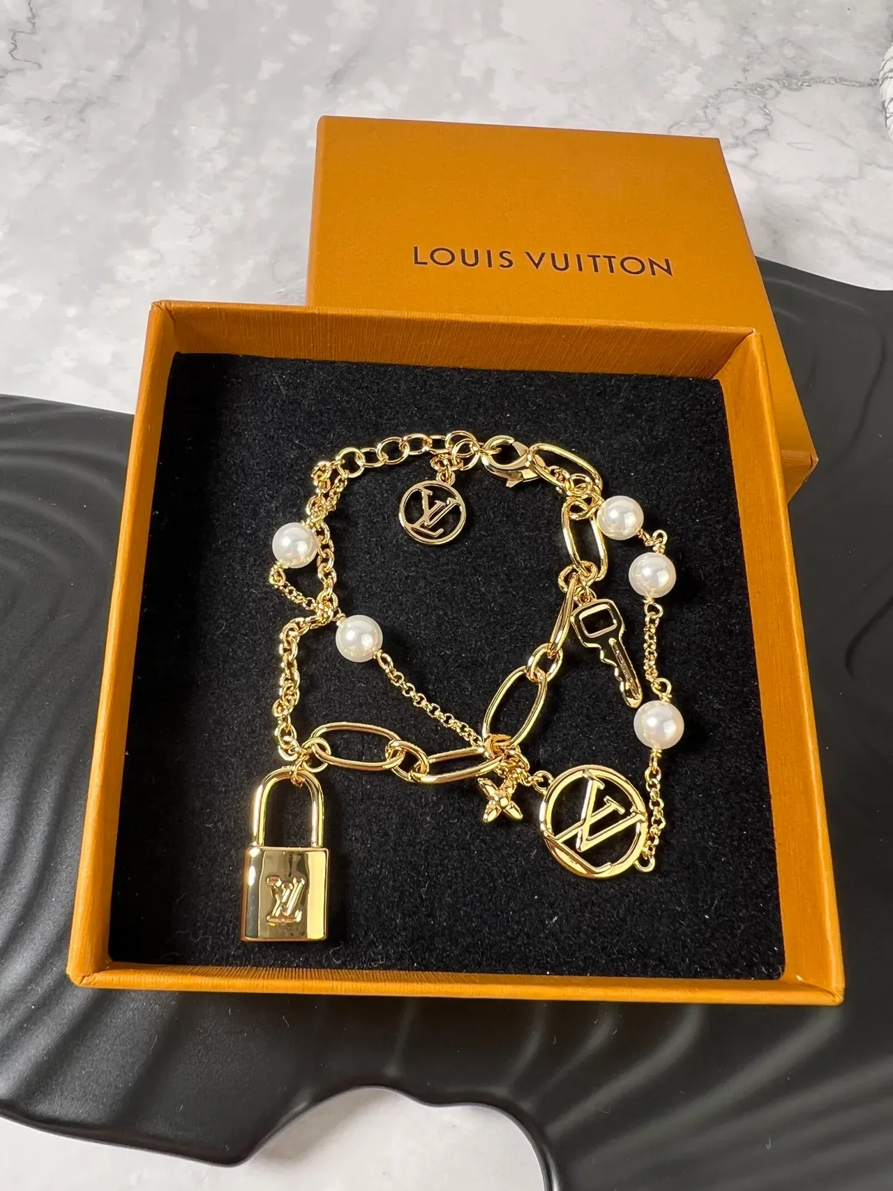 Louis Vuitton Lock Me Multi-Charm Gold-Tone Pearl Bracelet 2