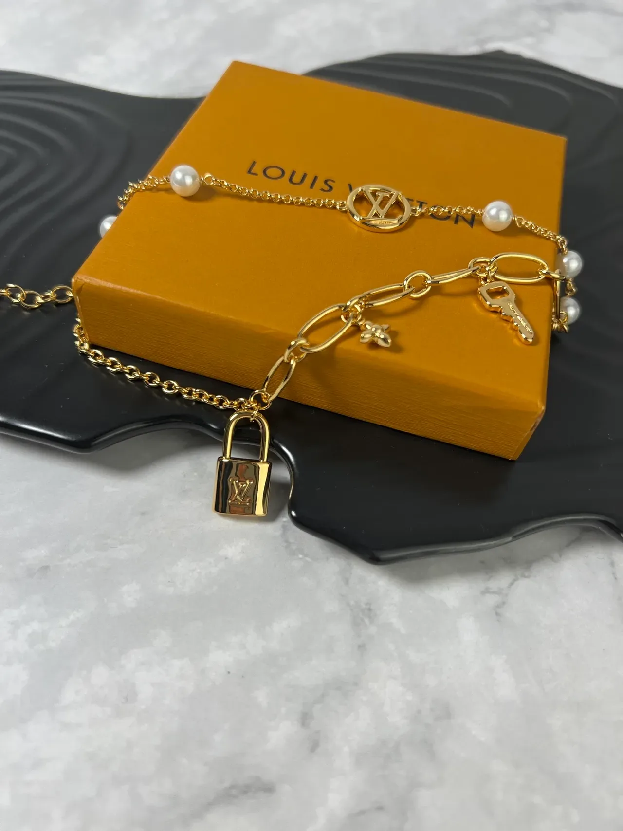 Louis Vuitton Lock Me Multi-Charm Gold-Tone Pearl Bracelet 3