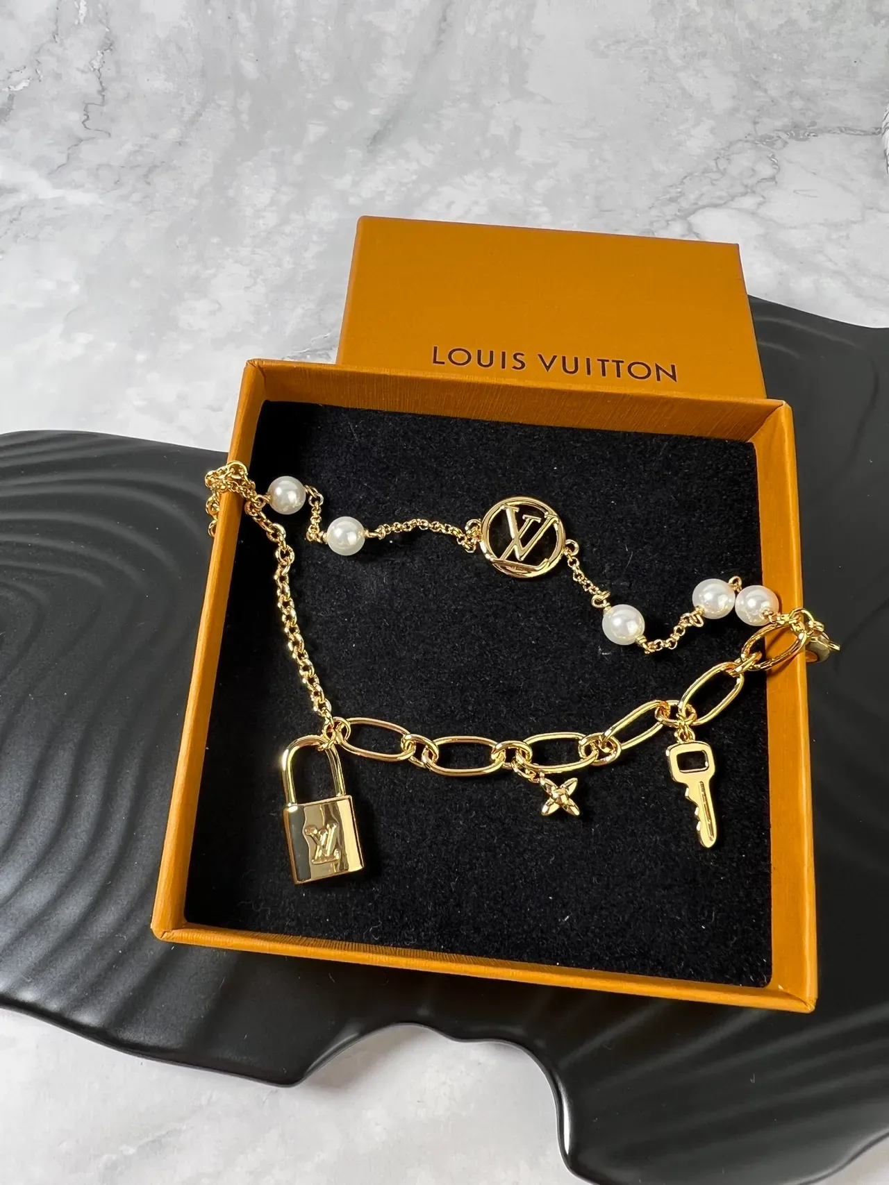Louis Vuitton Lock Me Multi-Charm Gold-Tone Pearl Bracelet 4