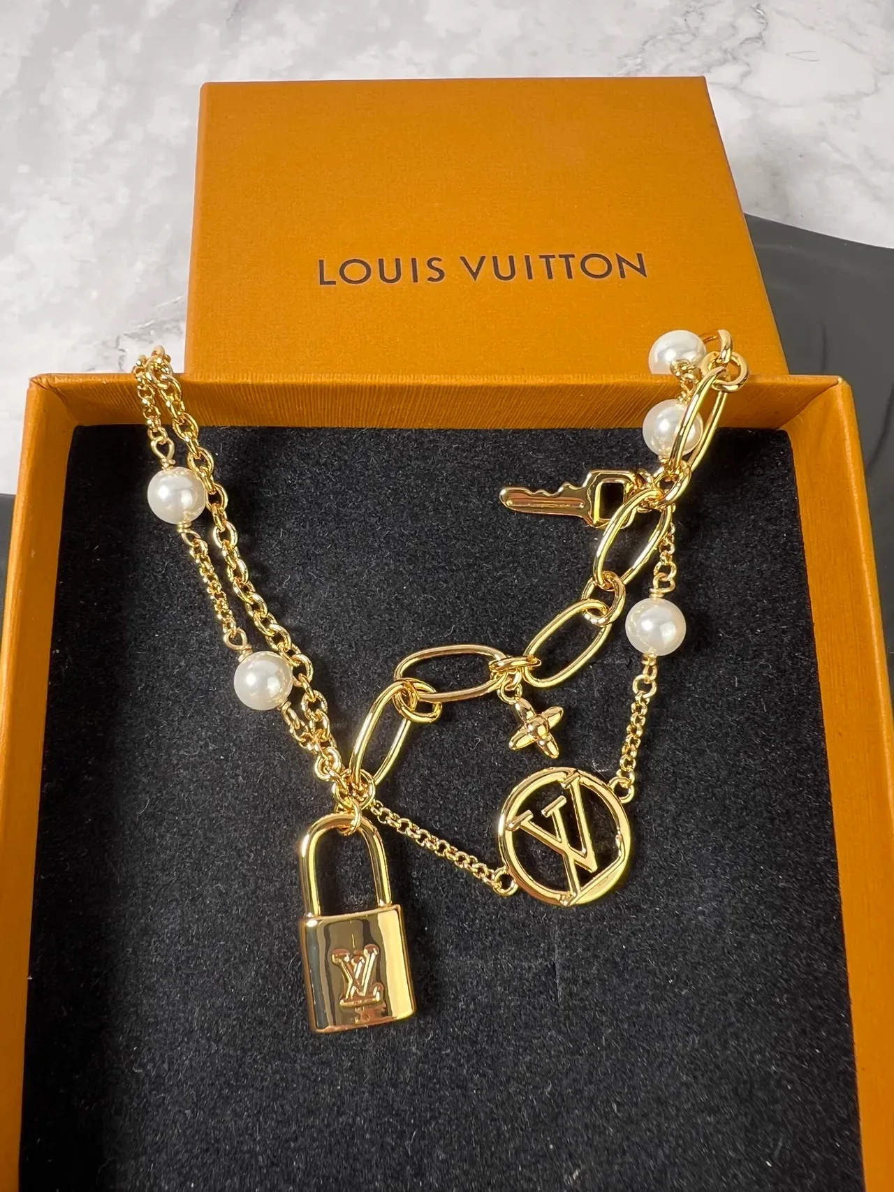Louis Vuitton Lock Me Multi-Charm Gold-Tone Pearl Bracelet 5