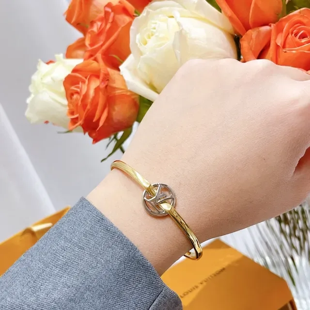 Louis Vuitton LV Circle Gold-Tone Interlocking Monogram Bracelet 9