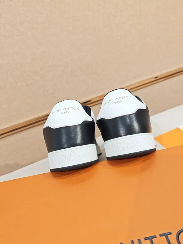 Louis Vuitton LV Trainer Black White Paneled Leather Monogrammed Side Lifestyle Sneakers 4
