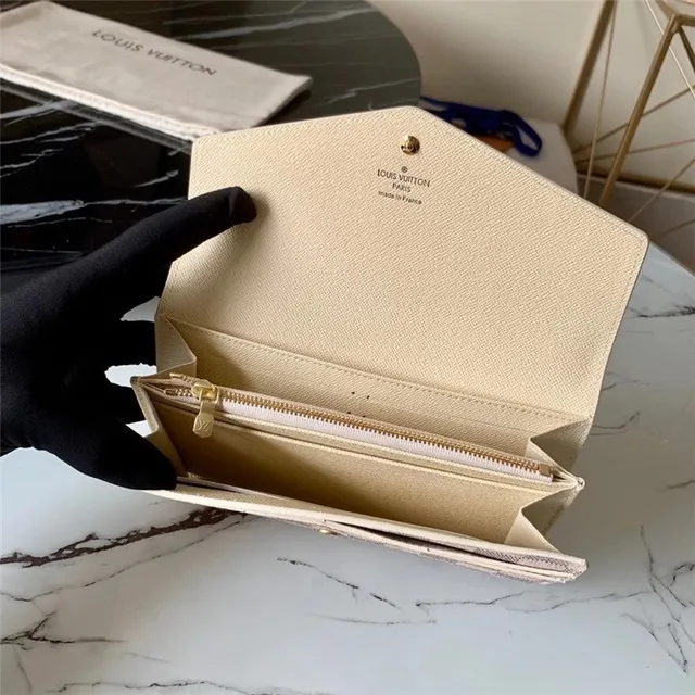 Louis Vuitton Monogram Canvas billetera larga con flap 5