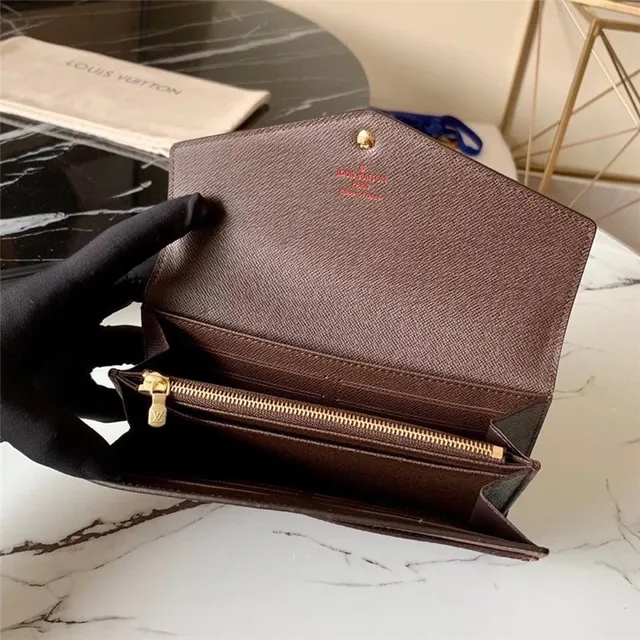 Louis Vuitton Monogram Canvas billetera larga con flap 15