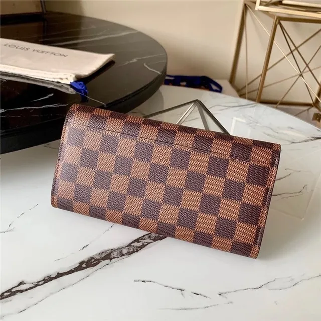Louis Vuitton Monogram Canvas billetera larga con flap 18