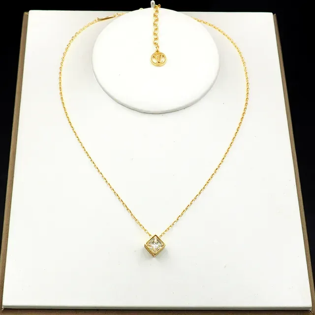 Louis Vuitton Monogram World Tour Cube Pendant Necklace 11