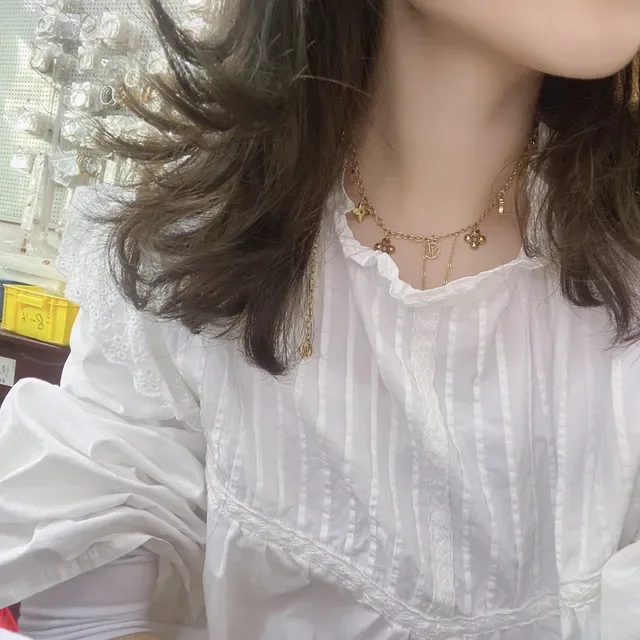 Louis Vuitton Multi Charm Gold-Tone Chain Necklace 6