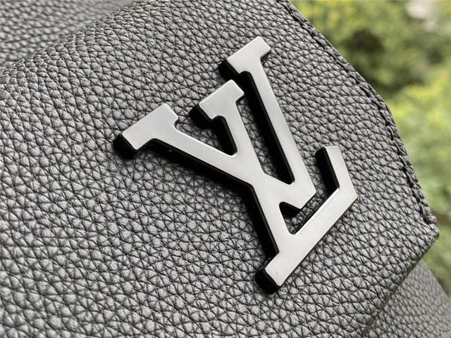 Louis Vuitton Orange Silver Structured Leather Embossed LV Monogram Casual Backpack 6